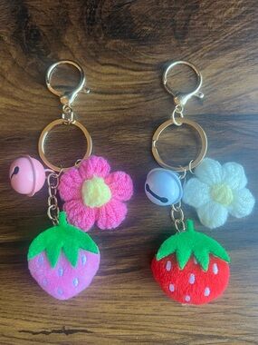 Plush Strawberry Keychain with Flower Charm and Bell Accent